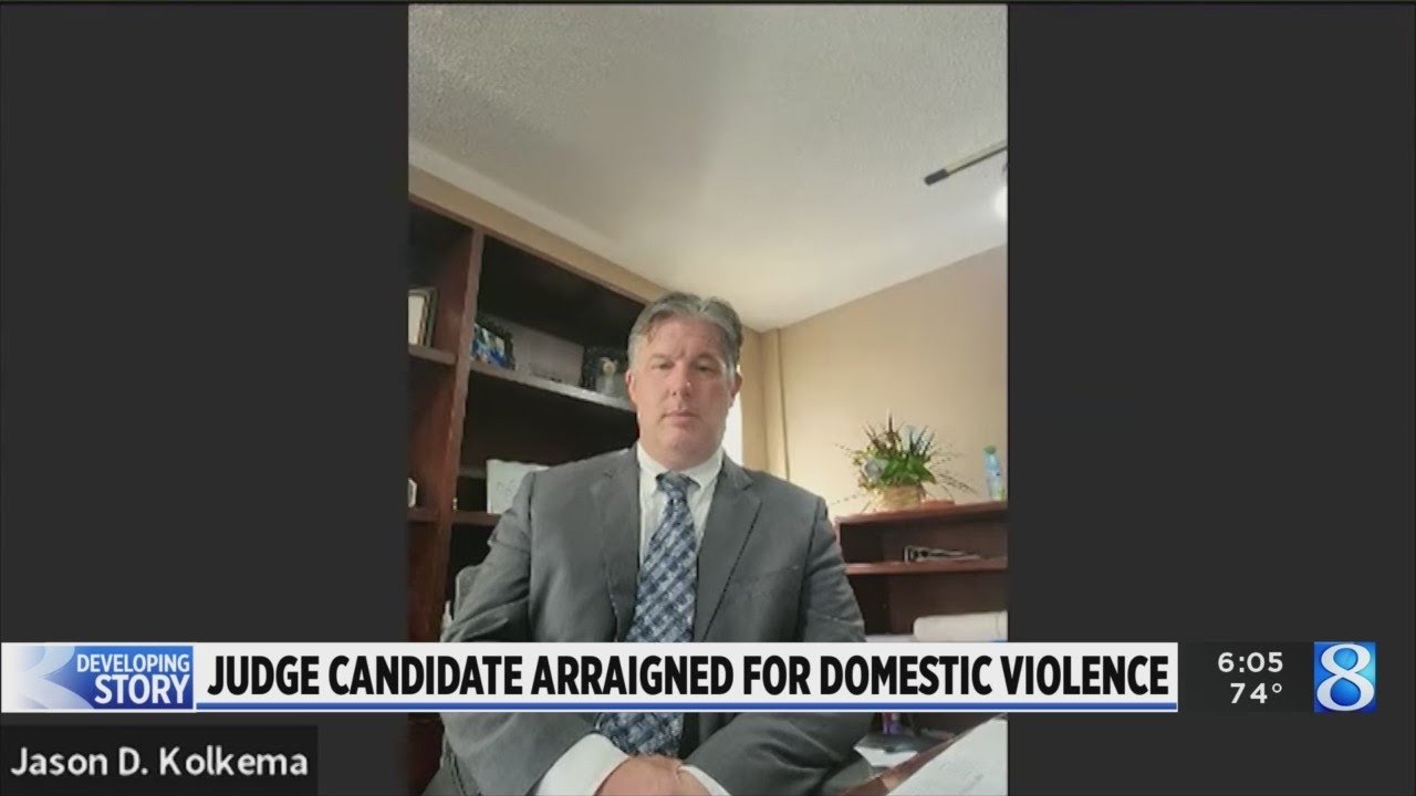 Judge candidate arraigned for domestic violence